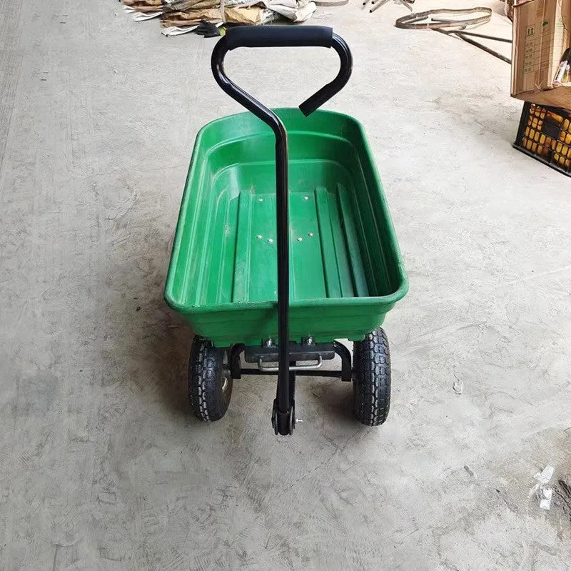 Green four-wheel plastic dump truck with Steel PP body, shown with load bay dimensions 94cm long by 52cm wide.