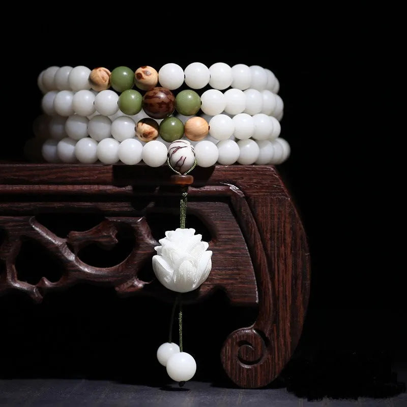 White jade Bodhi bead bracelet with 6x8mm beads in multiple design styles