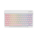 A 10-inch black Bluetooth keyboard with multi-colour LED backlit keys on a desk next to a tablet.