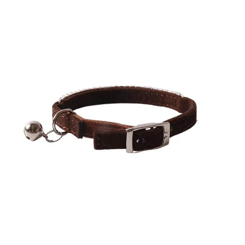 Soft flocking cat collar with an elastic buckle, shown in pink, black, red, blue, purple, and dark brown.