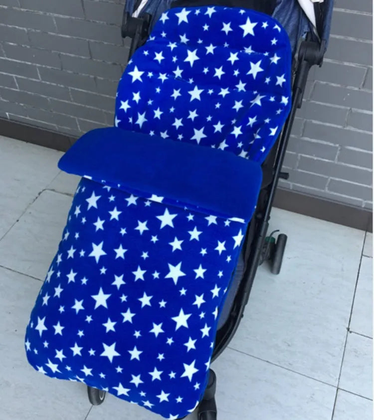 Envelope-style baby stroller sleeping bag in a choice of colours with cotton wool filling.