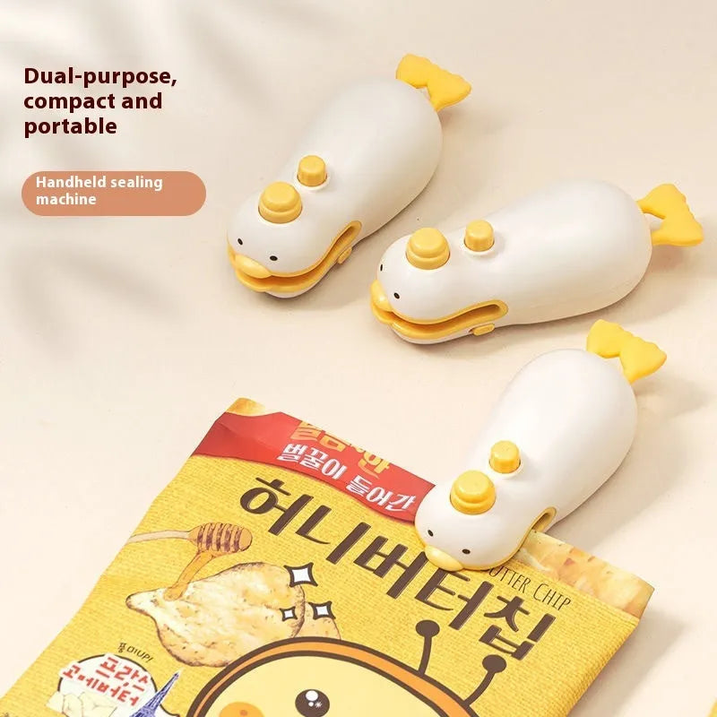 Yellow duck-shaped rechargeable handheld heat sealing machine with USB charging cable