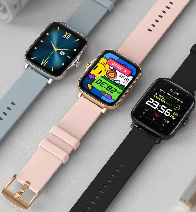 Black smart watch with 1.7-inch colour touch screen and silicone strap on a wrist.