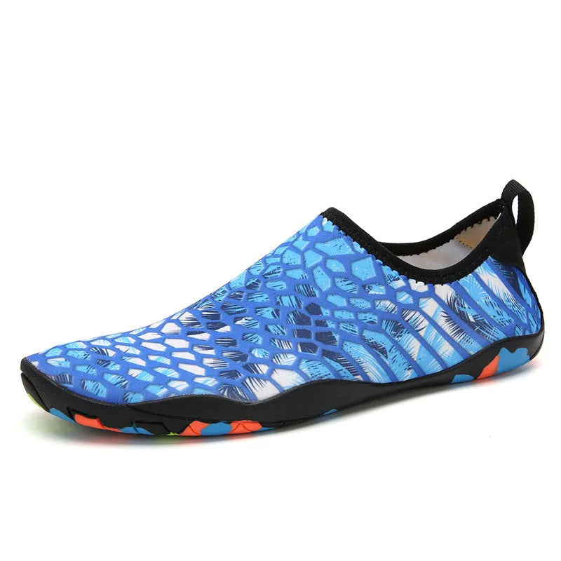 A pair of beach wading shoes for swimming, shown in camouflage colour with Lycra upper and EVA sole.