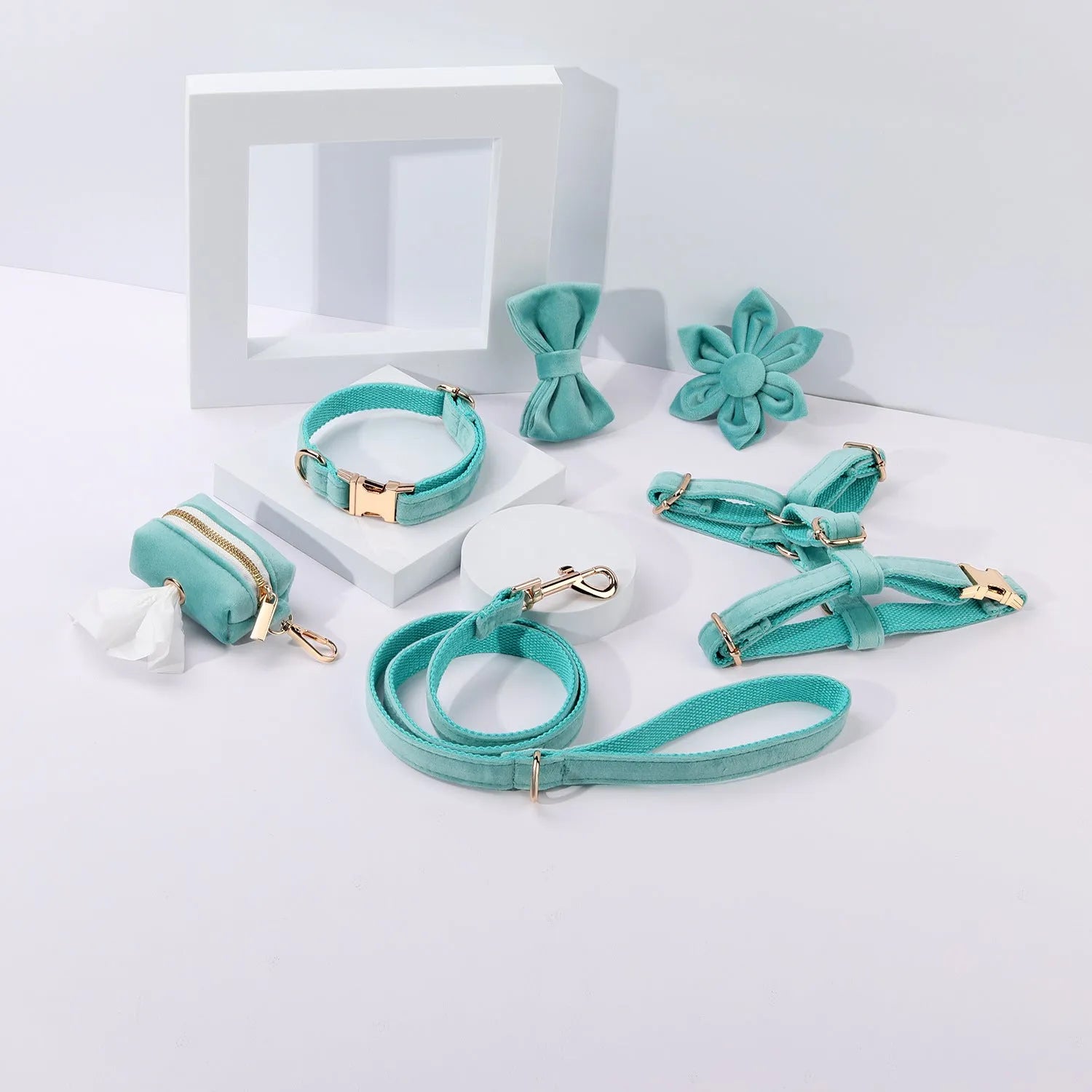 Classic velvet dog collar and matching lead set with chest strap, bow tie, and flower accessory in assorted colours.