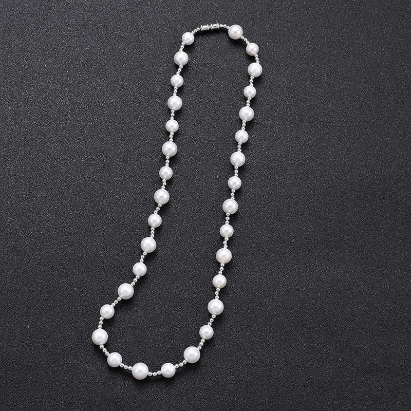 White freshwater pearl necklace with round bead chain and sterling silver platinum beads on a neutral background