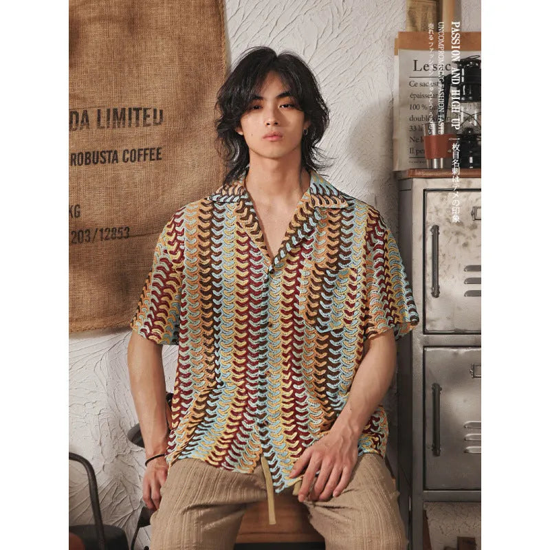 Grey slim fit men's Cuban collar short-sleeve shirt with textured jacquard fabric.