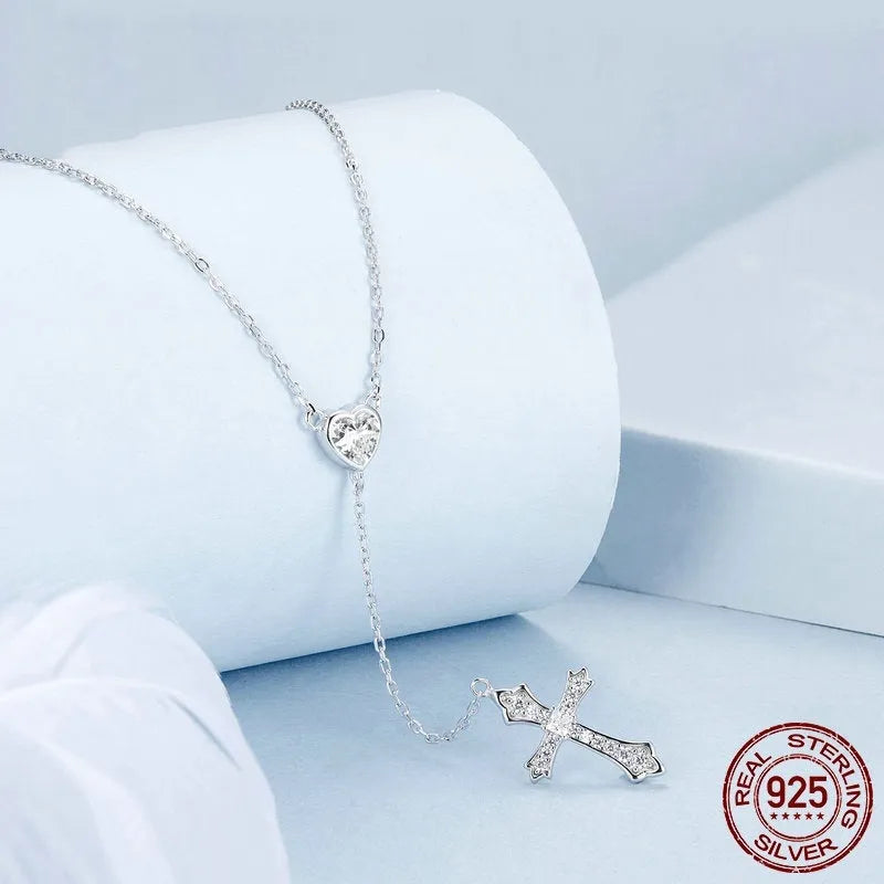 Silver love cross pendant necklace for women with 925 sterling silver pendant and O-ring chain.