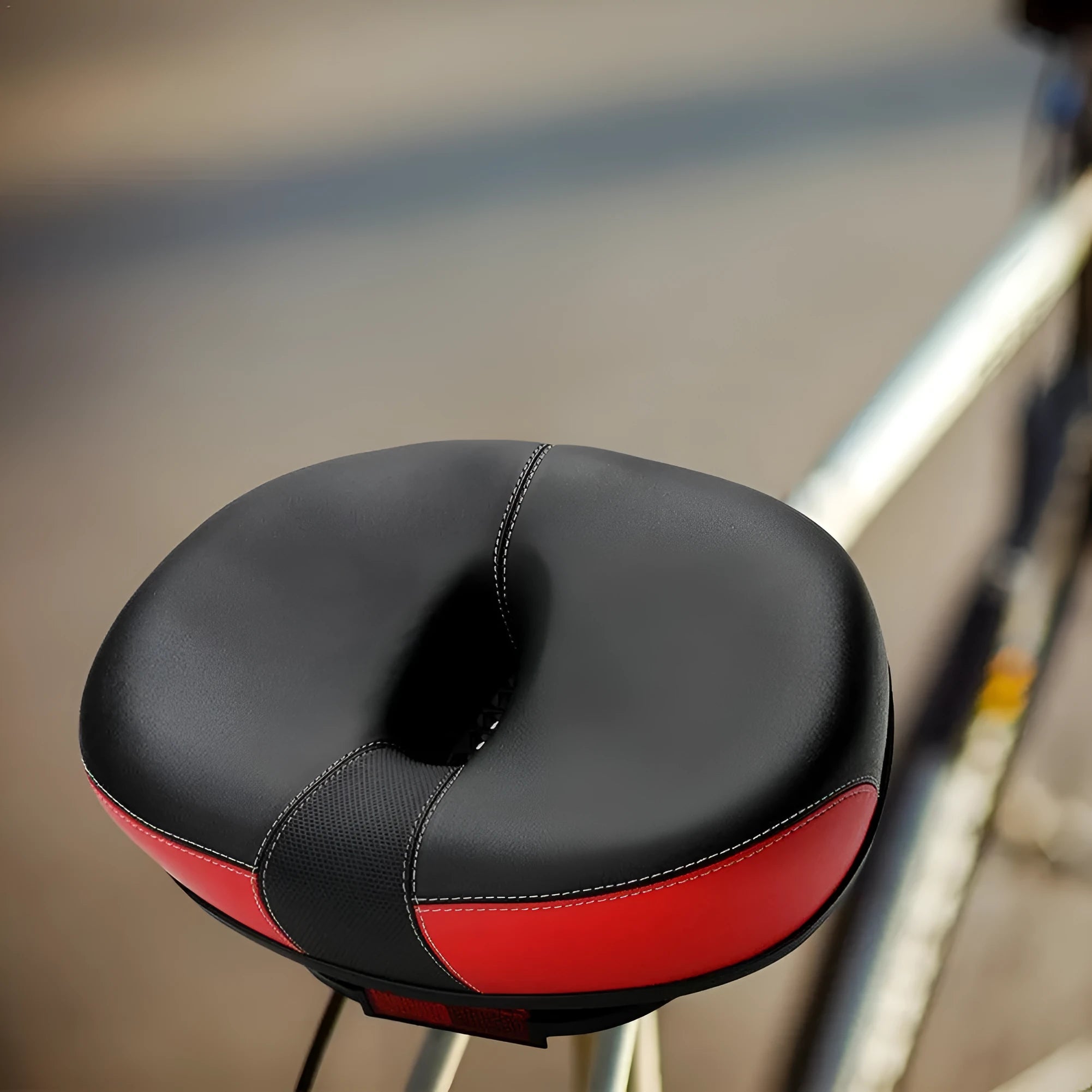 Red mountain bike saddle with thickened cushioning and reflective stickers, showing 210x270mm dimensions