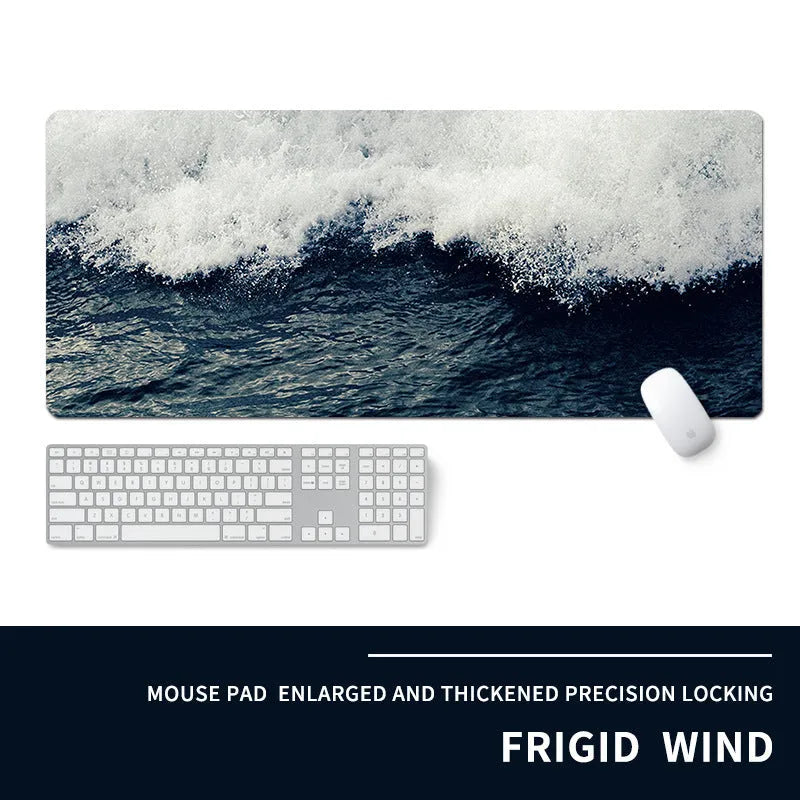 Oversized gaming mouse pad with cold-themed design on natural rubber base