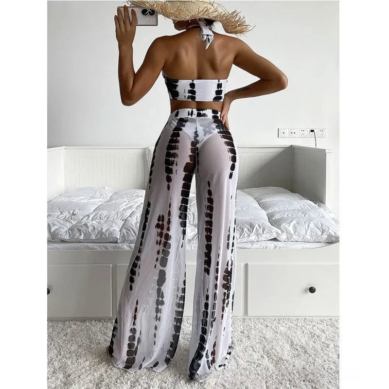 Women's black printed three-piece swimsuit set with bikini top and mesh trousers