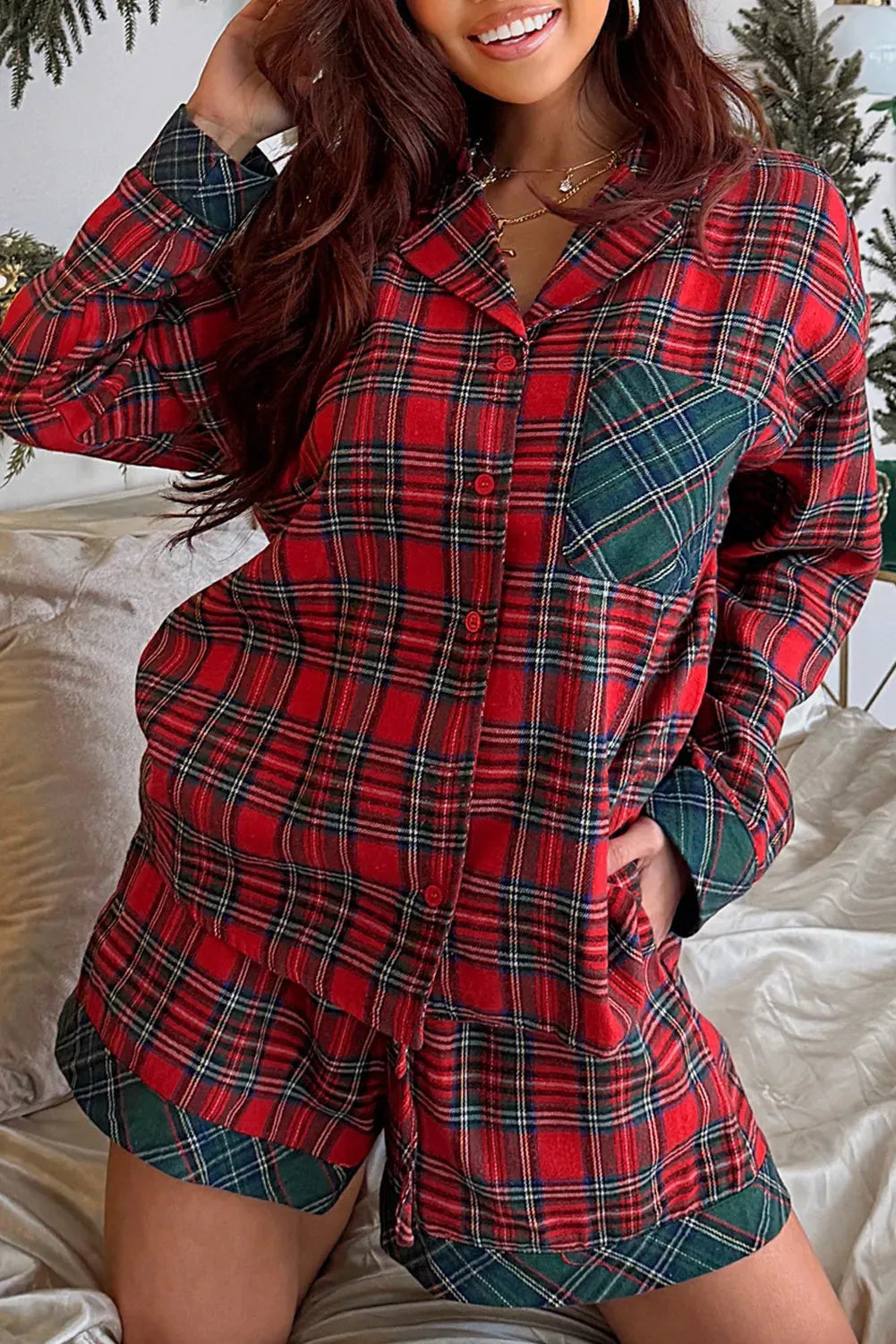 Red plaid Christmas pajama set with long sleeve shirt and matching shorts