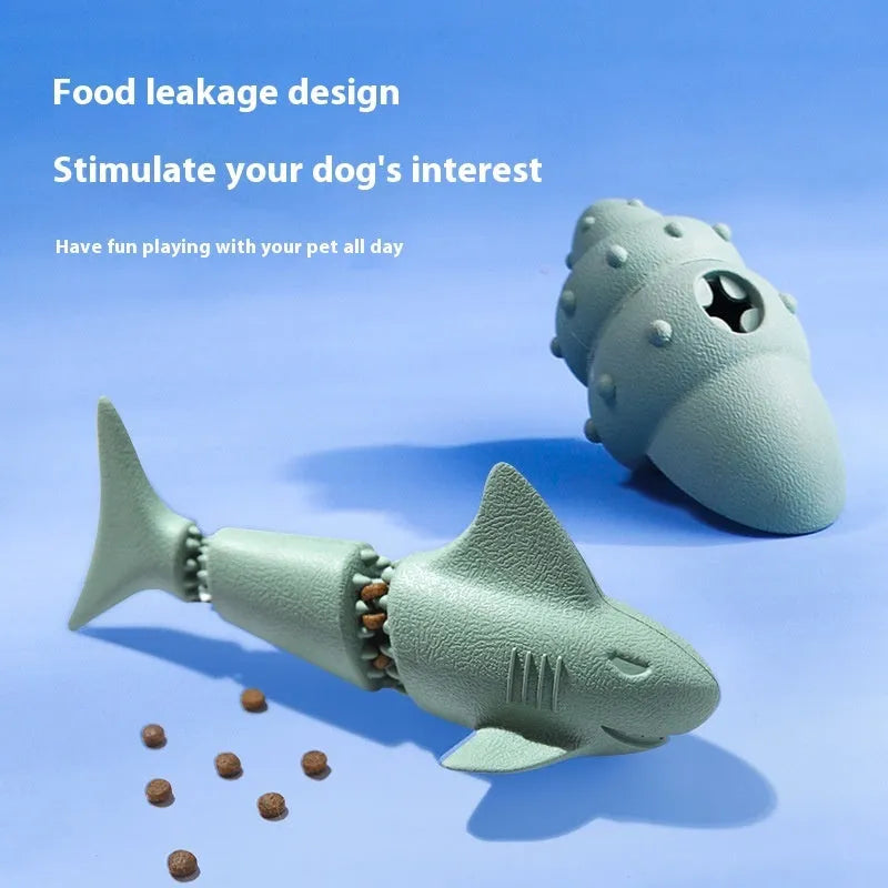 Shark-shaped rubber dog toy in marine colours including conch blue, conch green, starfish blue, and starfish green options