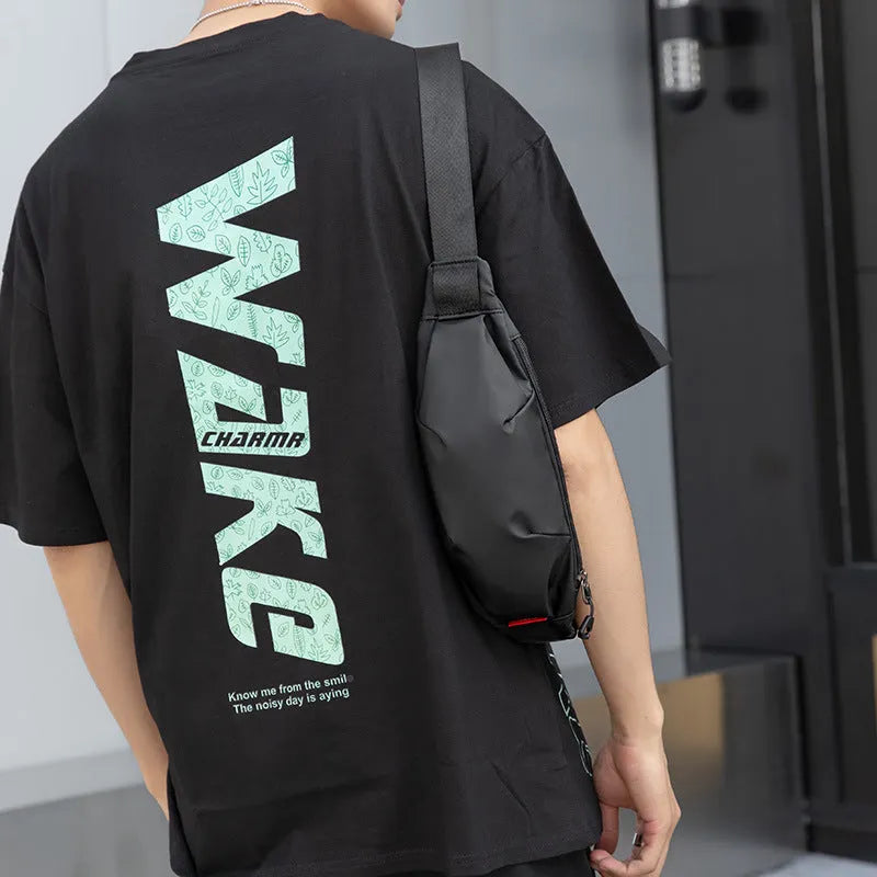 Black men's Oxford cloth crossbody waist pack showing front view and internal phone pocket.