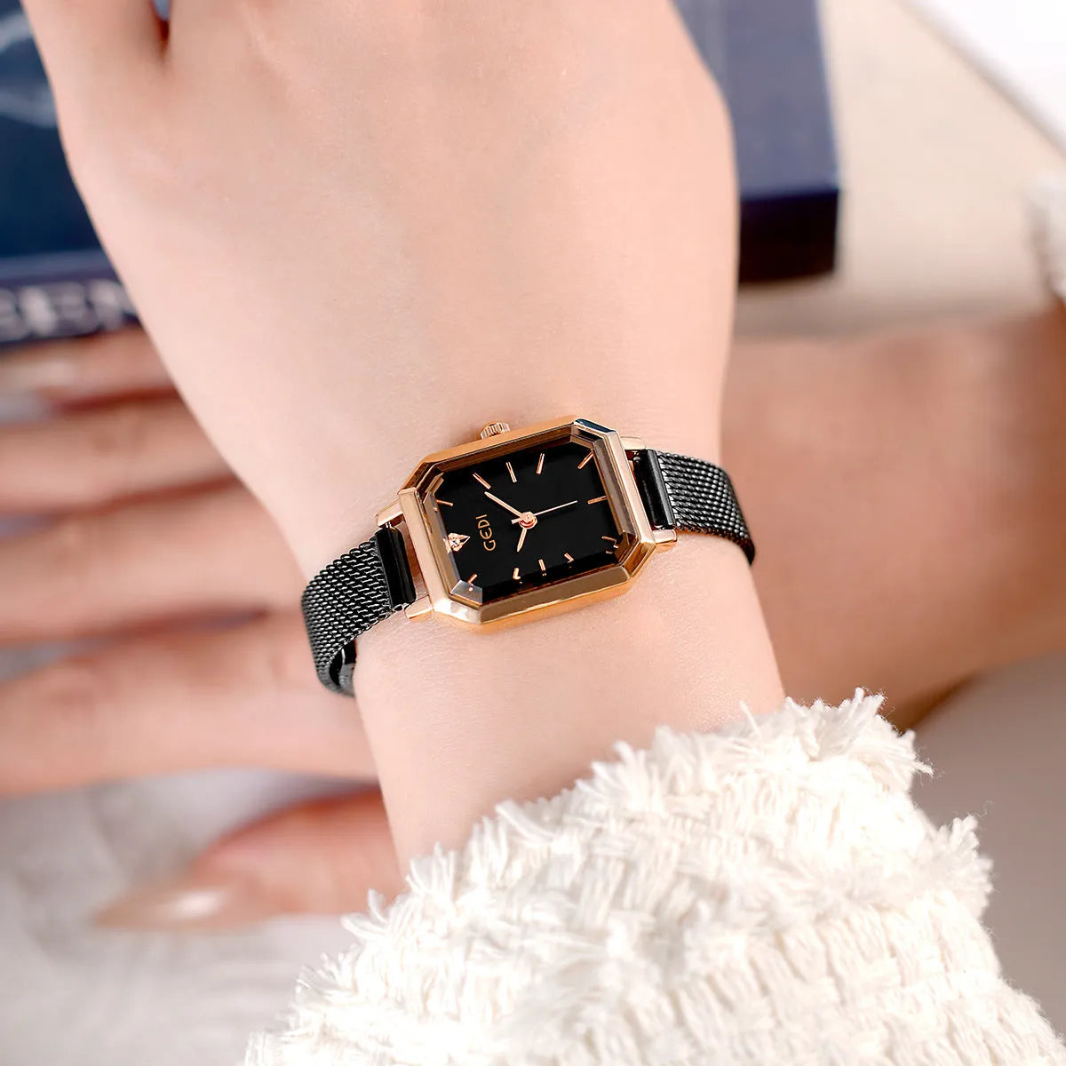 Women's casual retro square watch with rose gold shell and black dial on black strap