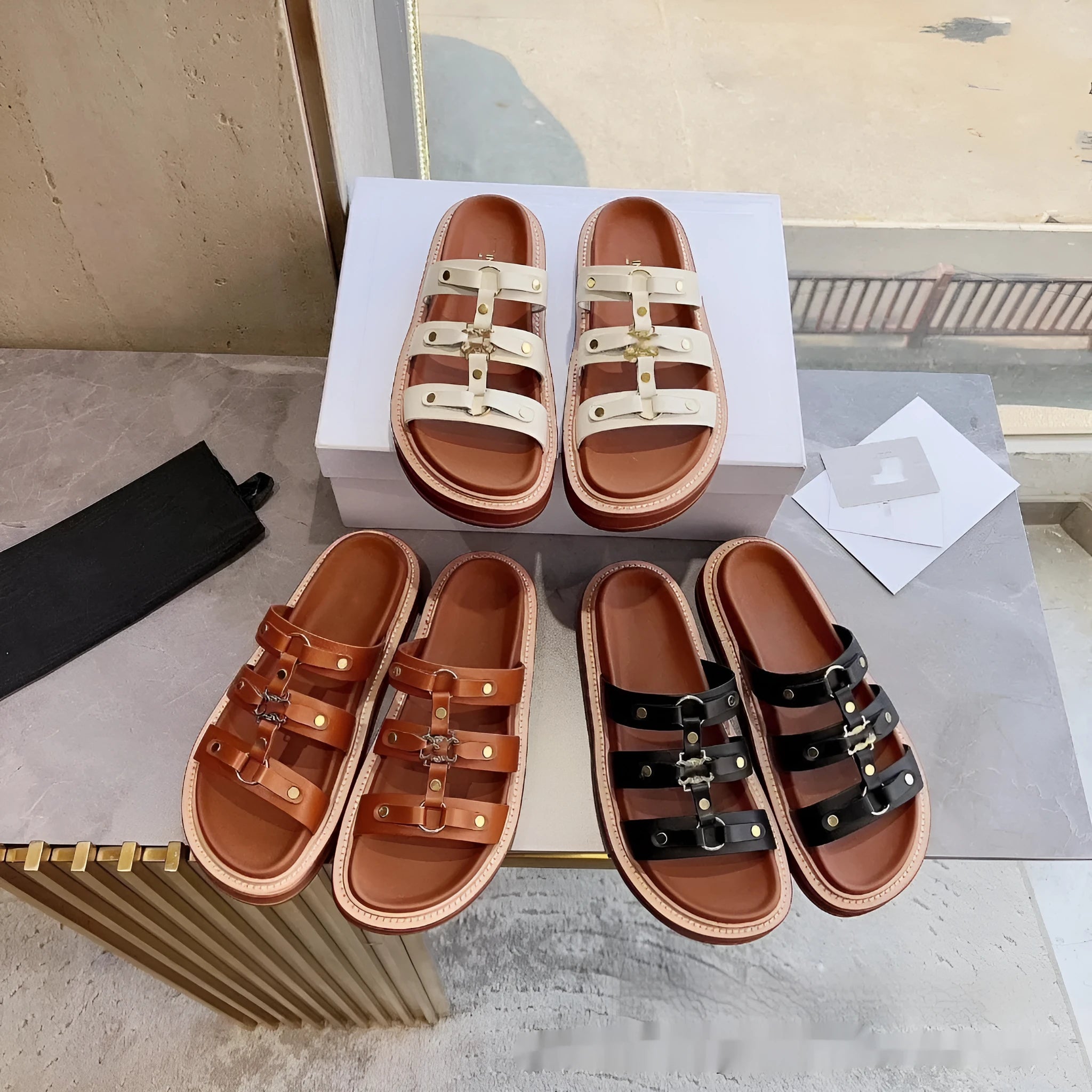 Women's Roman sandal slippers in genuine sheepskin leather available in black, brown, and white colours