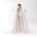 Women's chiffon bubble towel scarf in summer colours showing texture and length