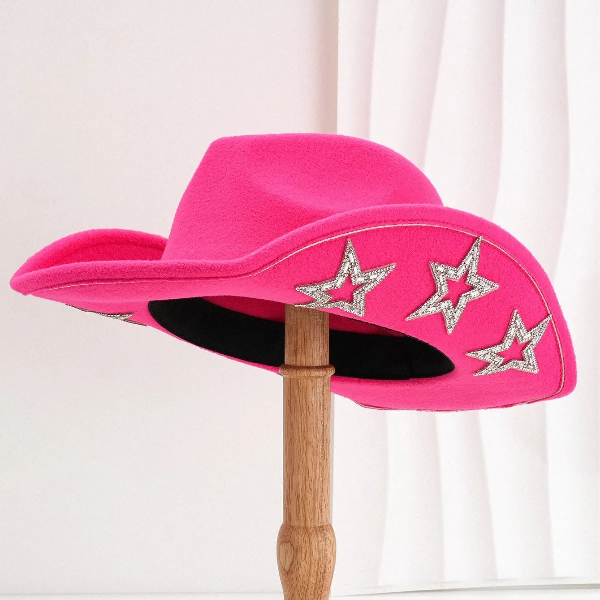 Beige polyester western denim top hat with a conical crown and a silver hexagonal star decoration on the front.