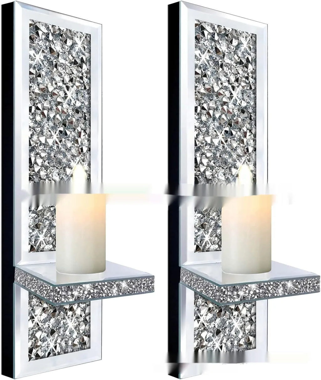 Pair of tall, silver mirror glass candlesticks designed for wall mounting in a living room.