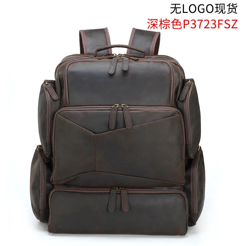 Dark brown Retro Crazy Horse leather backpack for a 17-inch laptop, showing embossed details and double straps.