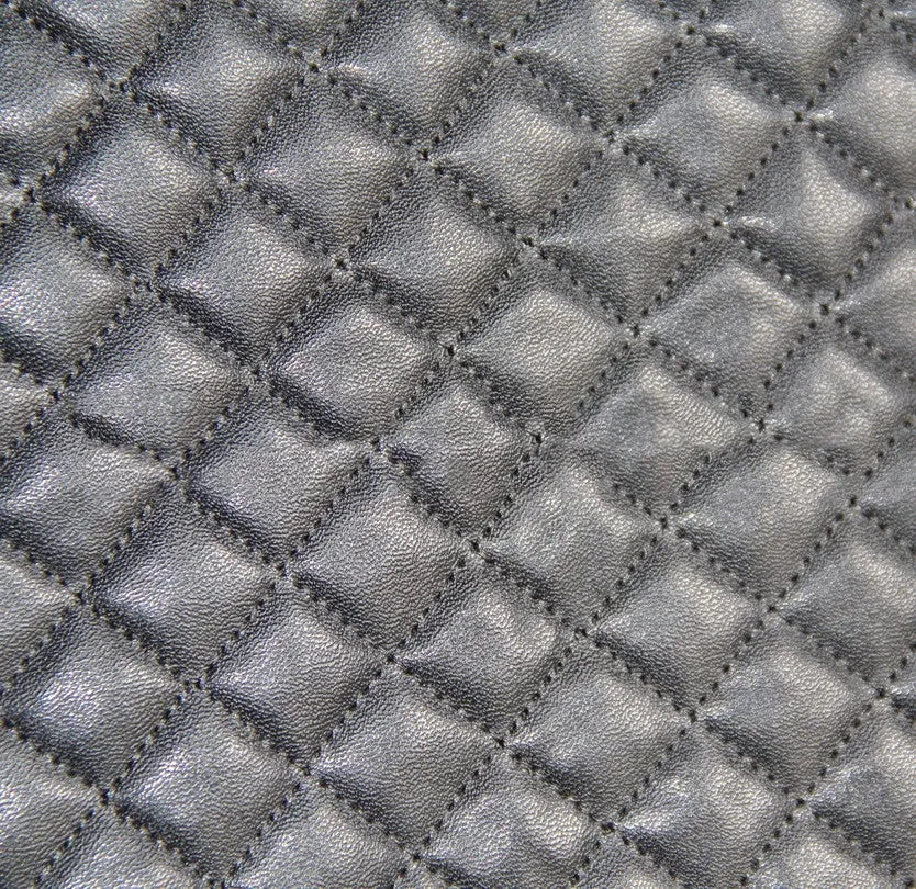 Black quilted automotive seat cover with plastic hooks for car interior protection