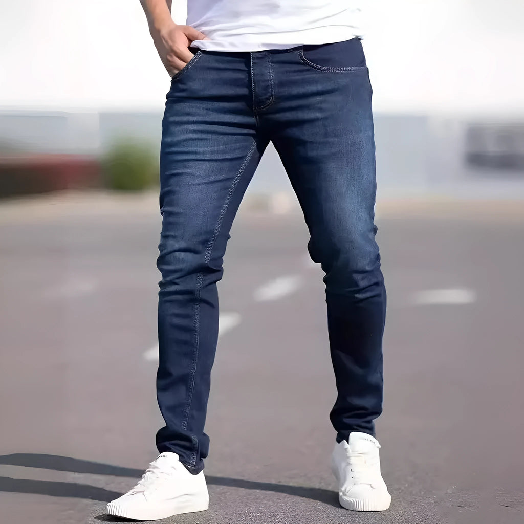 Men's dark blue slim fit cotton jeans with skinny style and mid-waist design