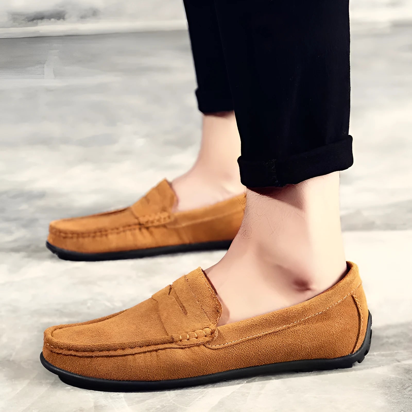 Men's brown suede casual loafers with flat rubber sole and round toe on a white background
