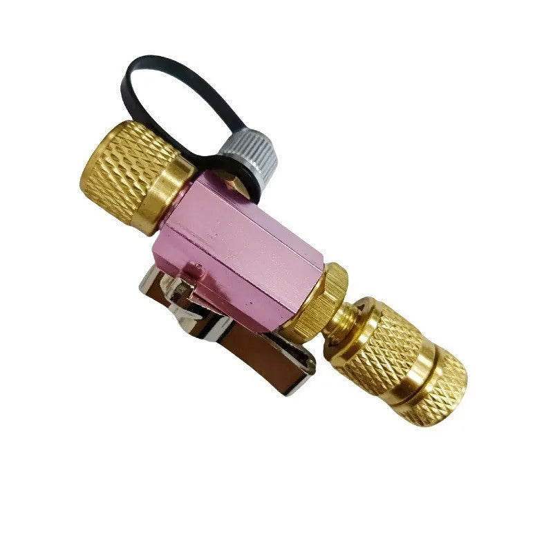 Metal vacuum valve core disassembly tool set showing black and pink colour variations