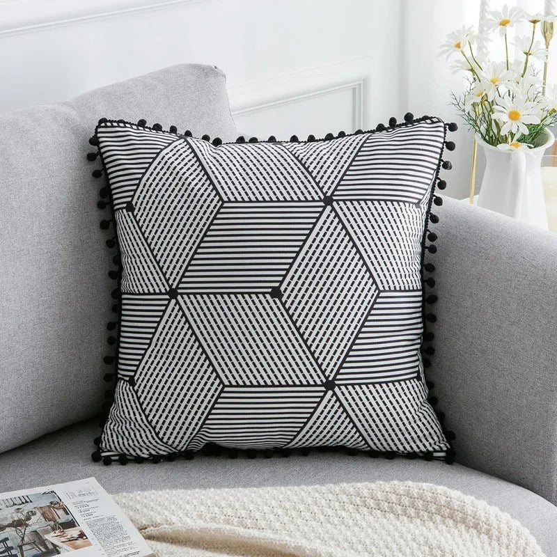 Bohemian style throw pillow on a sofa, available in light grey, black, or white, shown in 45x45cm size.