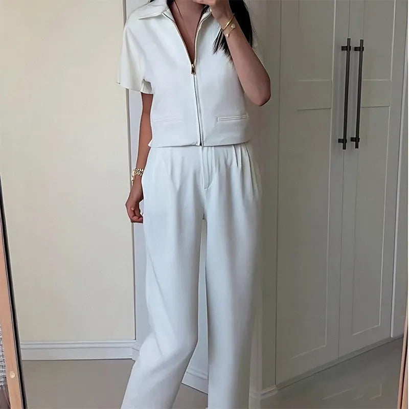 Loose fit casual polyester top in yellow on a hanger
