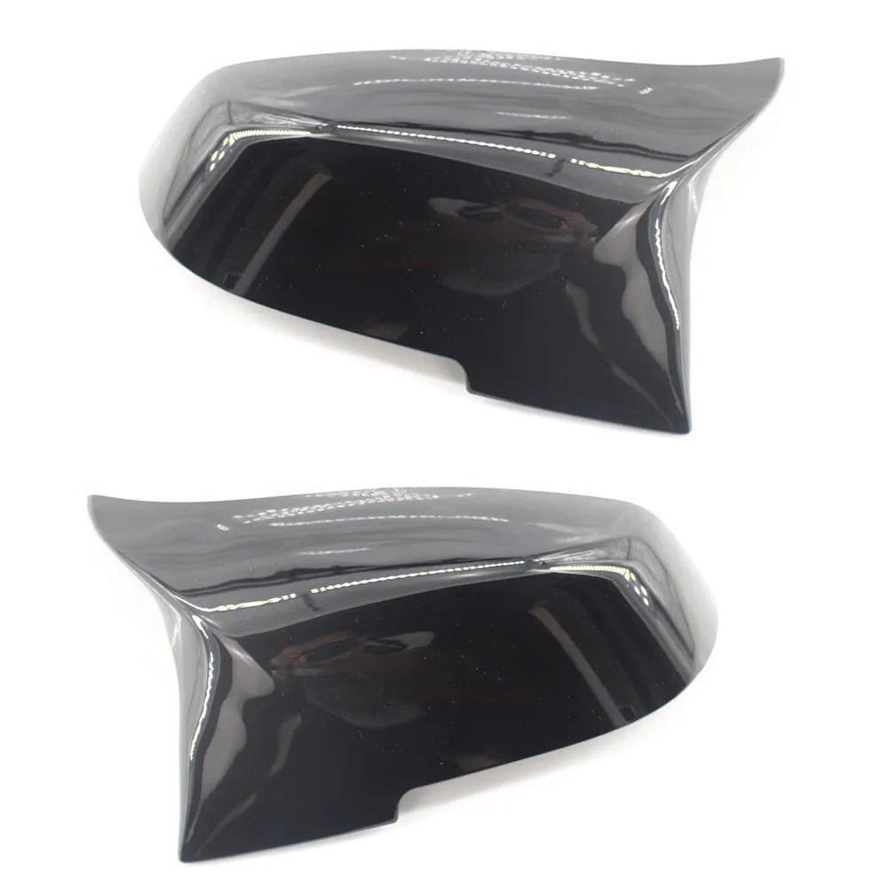 Paint bright black replacement rear-view mirror shell for BMW 3 Series and 4 Series F-model vehicles.
