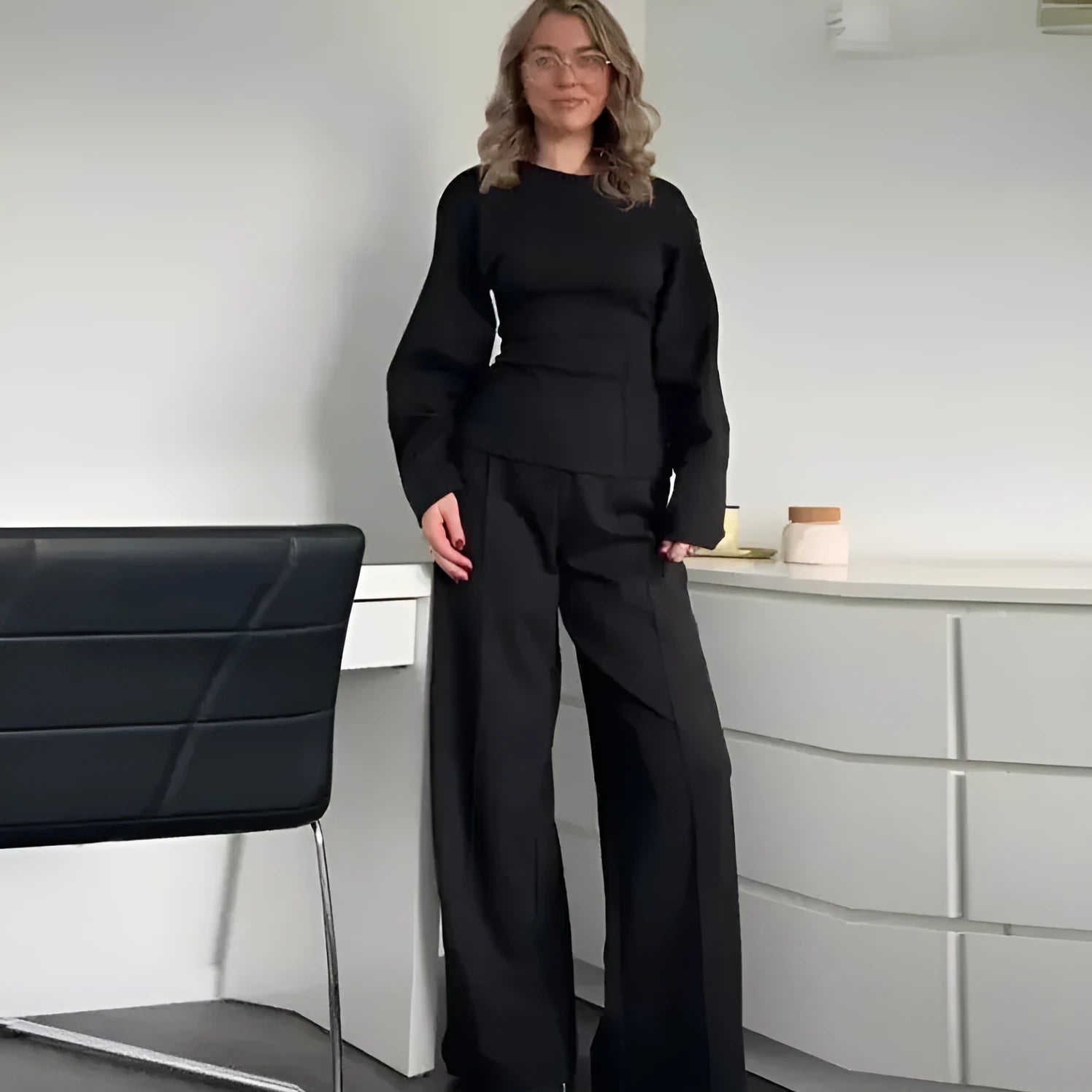 Women's polar fleece suit set showing O-neck pleated top and wide leg trousers in coordinating colours