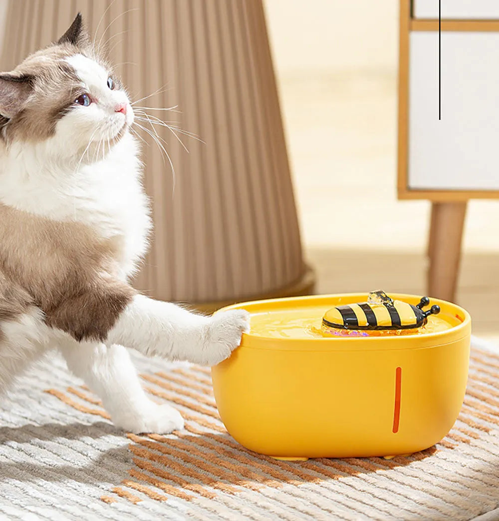 Yellow 4-litre pet water fountain with filter and blue LED light for cats and dogs
