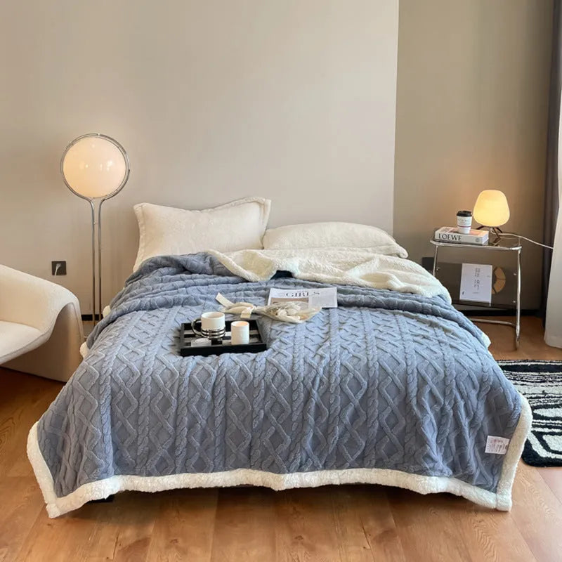 Polyester thermal flannel blanket in beige colour, shown folded to display its thick texture and modern style