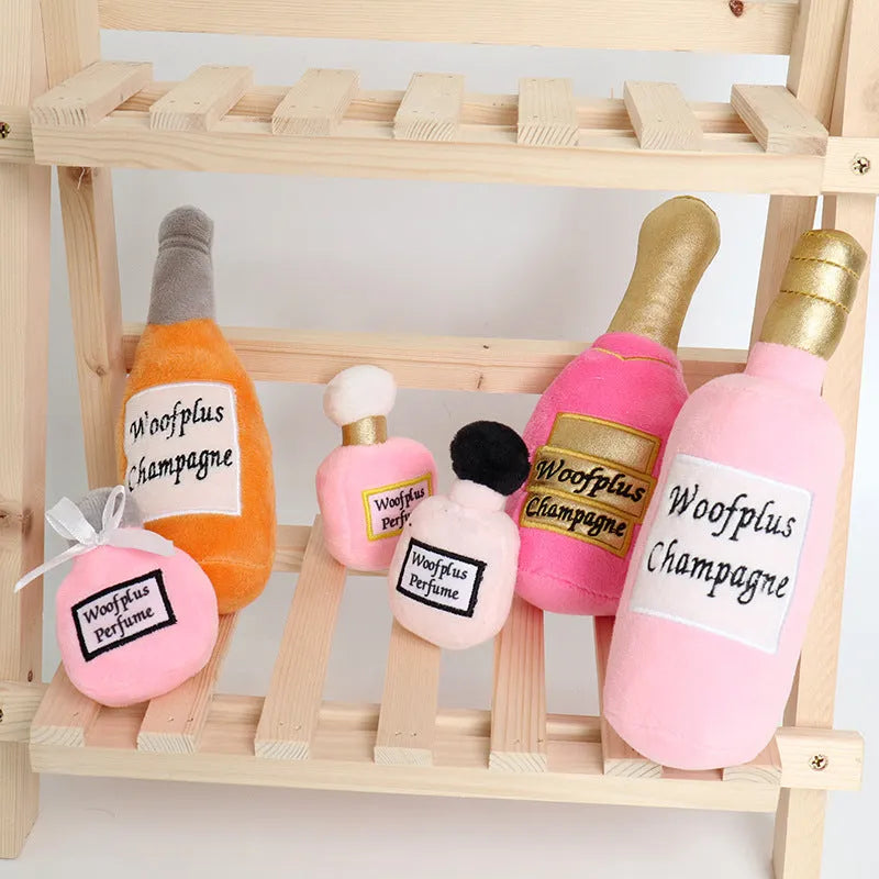 Green plush pet toy shaped like a wine bottle for dogs or cats to play with.