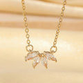 Rhinestone leaf necklace copper geometric pendant gold colour on display