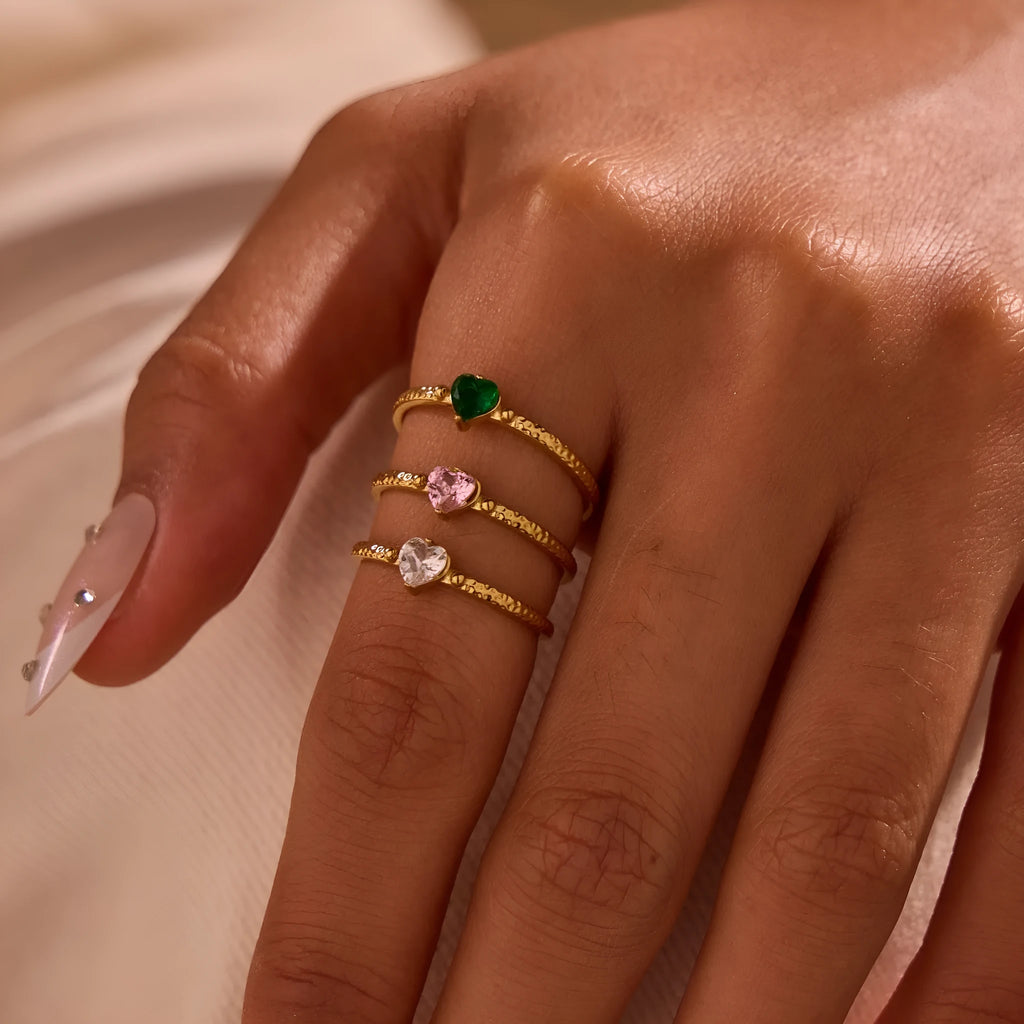 Open-ended stainless steel ring with heart-shaped zircon accents in adjustable free size design