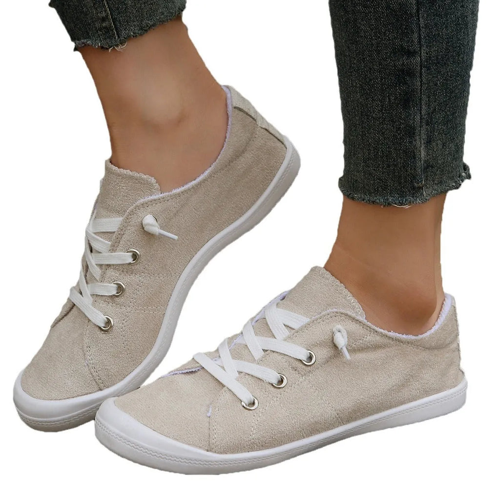 Women's creamy white fabric low-top casual sneakers with rubber sole
