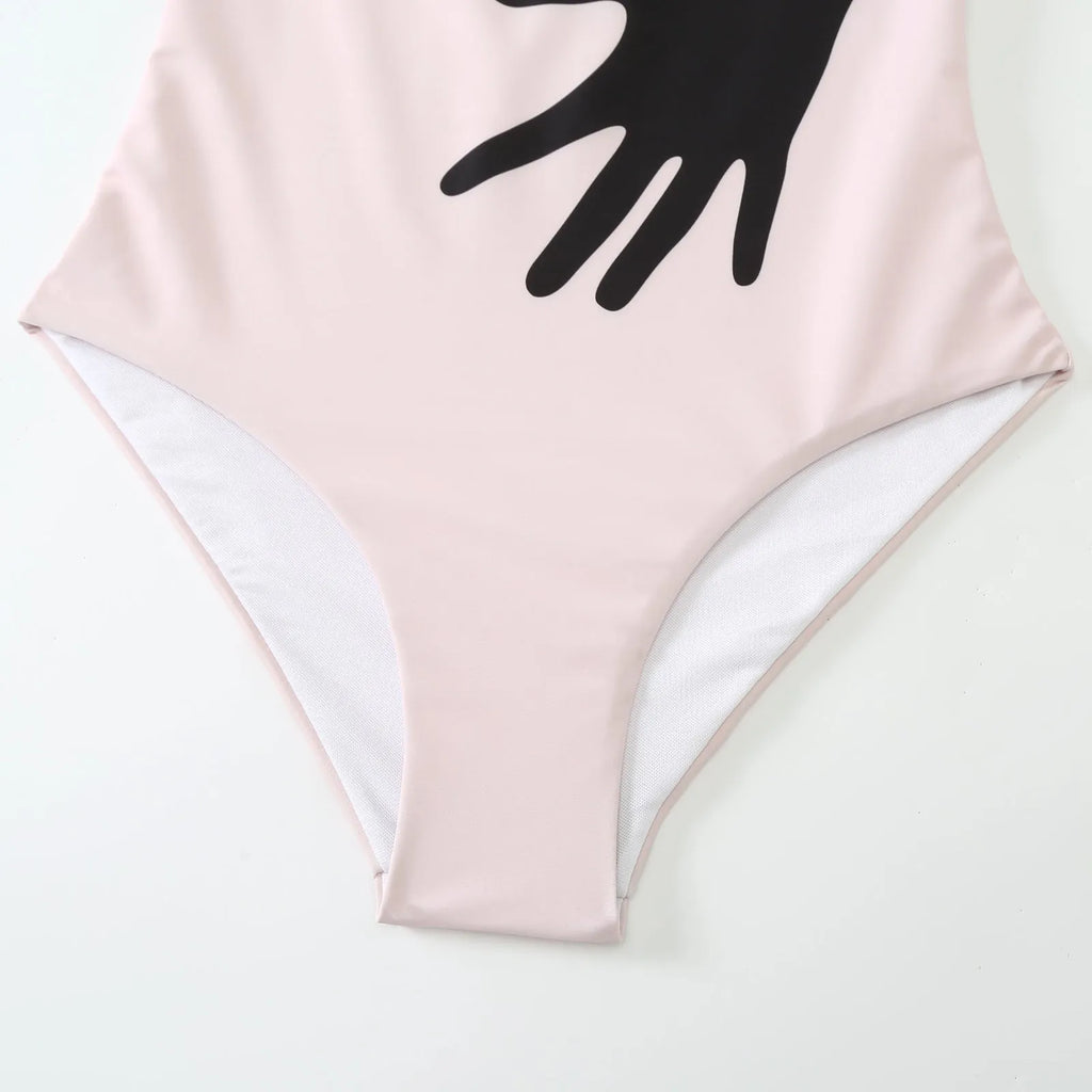 Women's patterned polyester swimsuit with attached tulle skirt in one-piece bikini design