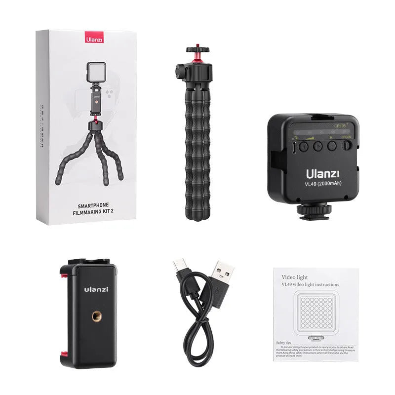 Multifunctional VLOG suite box containing a professional tripod for live streaming and photography.