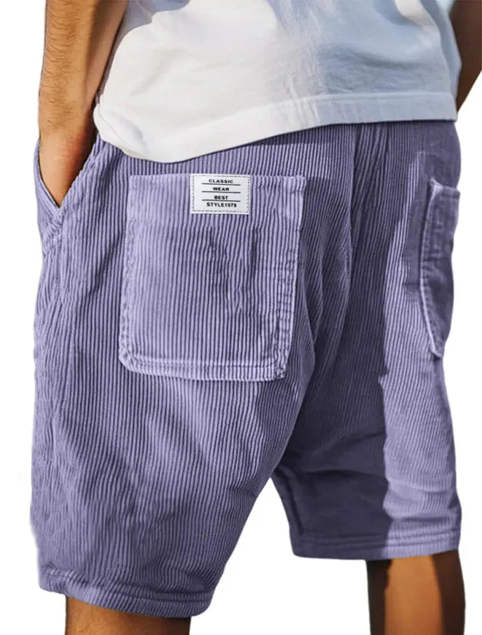 Men's grey straight-fit corduroy shorts with multiple pockets and a small embroidered logo on the leg.