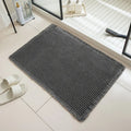 A square, checkered-pattern absorbent bathroom floor mat with a non-slip backing, shown in a neutral colour.