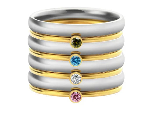 December birthstone ring with blue and turquoise superimposition on geometrically engraved titanium steel band