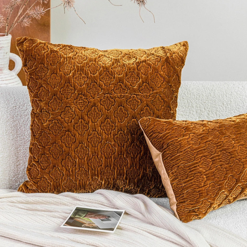 Brown gold antique Chinese style quilted cushion pillow on a sofa