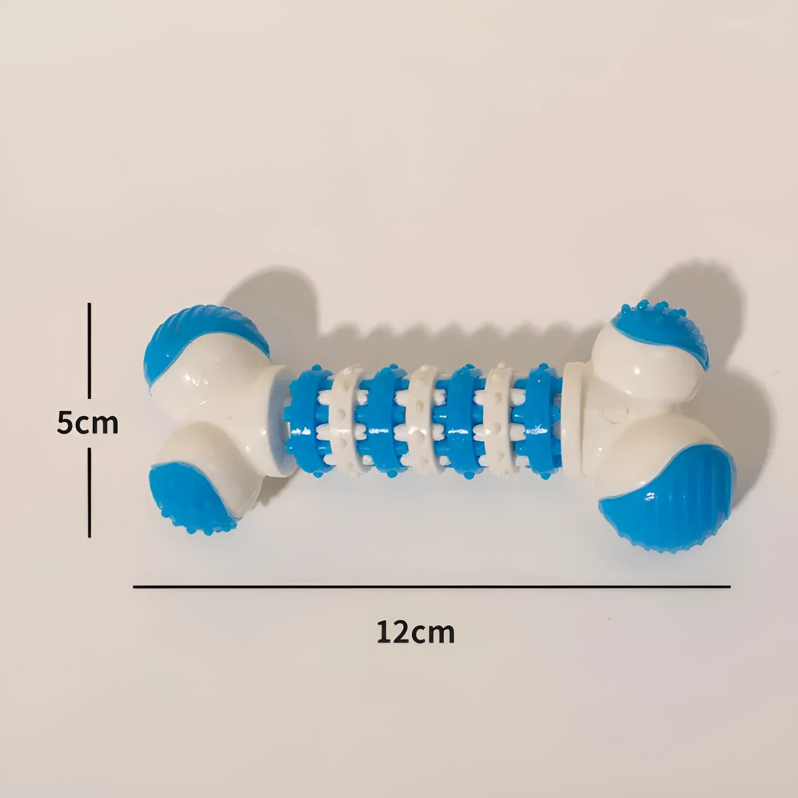 Blue bone-shaped interactive dog chew toy with hollow treat compartment for small breed dogs.