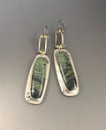Geometric two-colour marble pattern alloy earrings with minimalist stud design