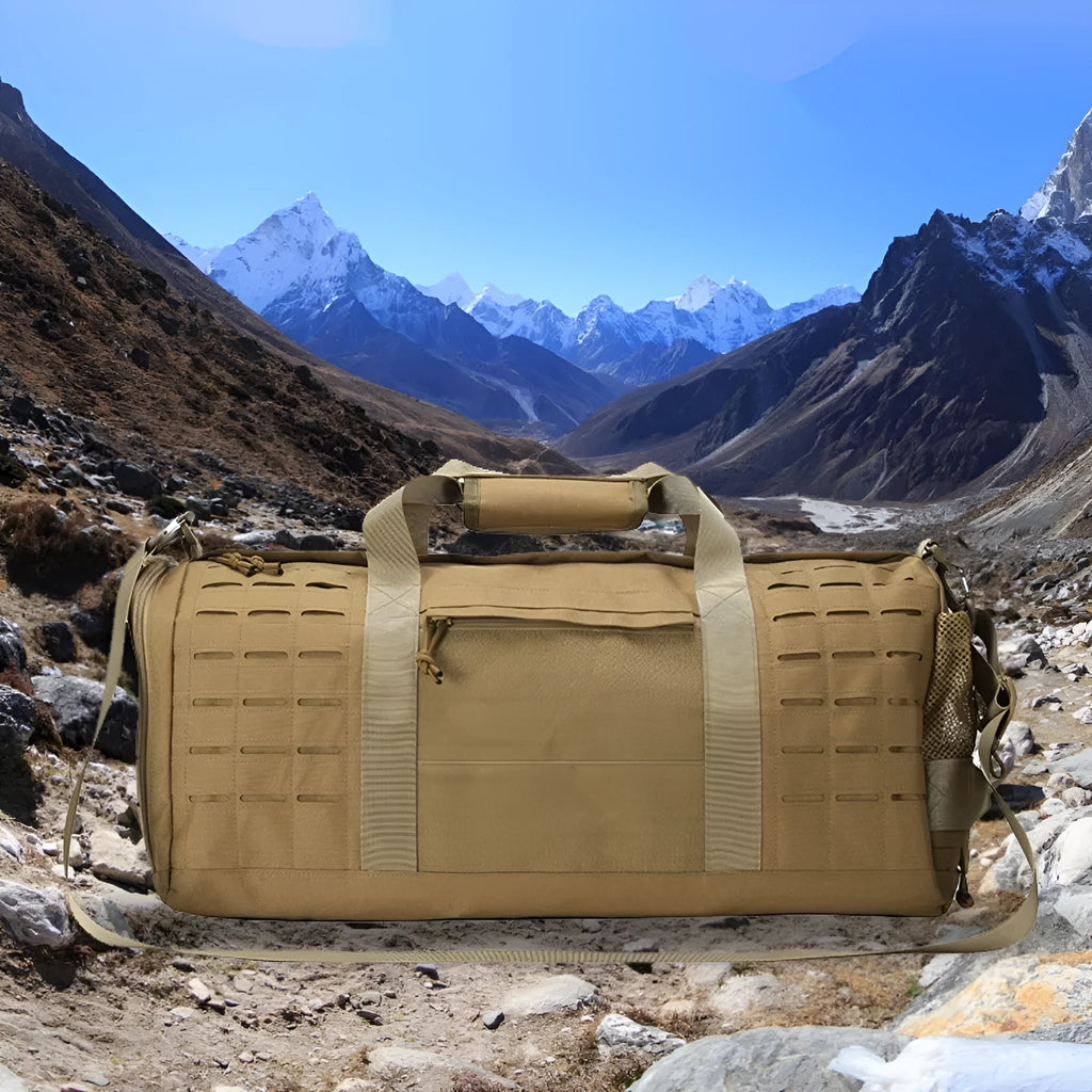 Large khaki men's waterproof sports duffel bag with air cushion shoulder strap, shown next to gym equipment.