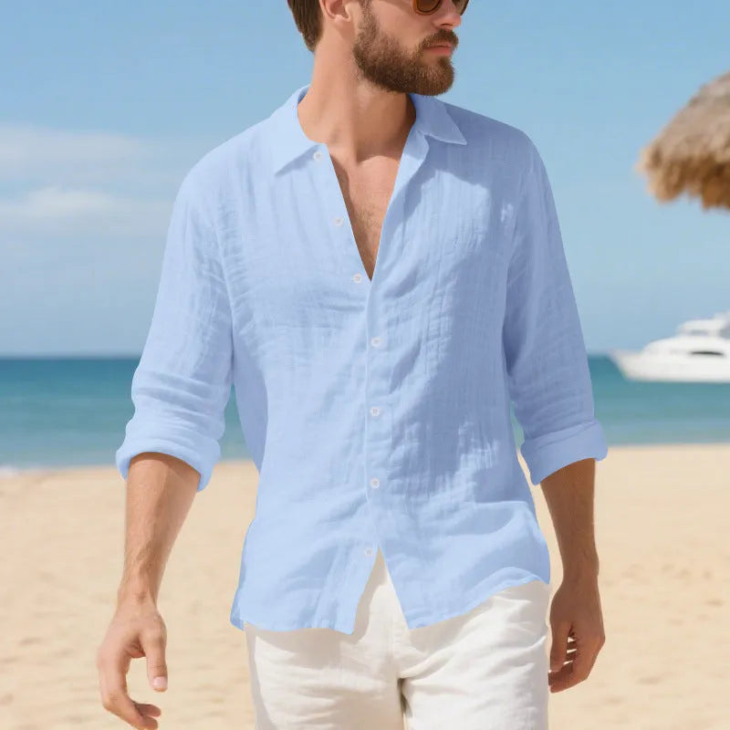 Man wearing a loose-fitting linen casual shirt in a light colour, showing the non-iron texture and American style.
