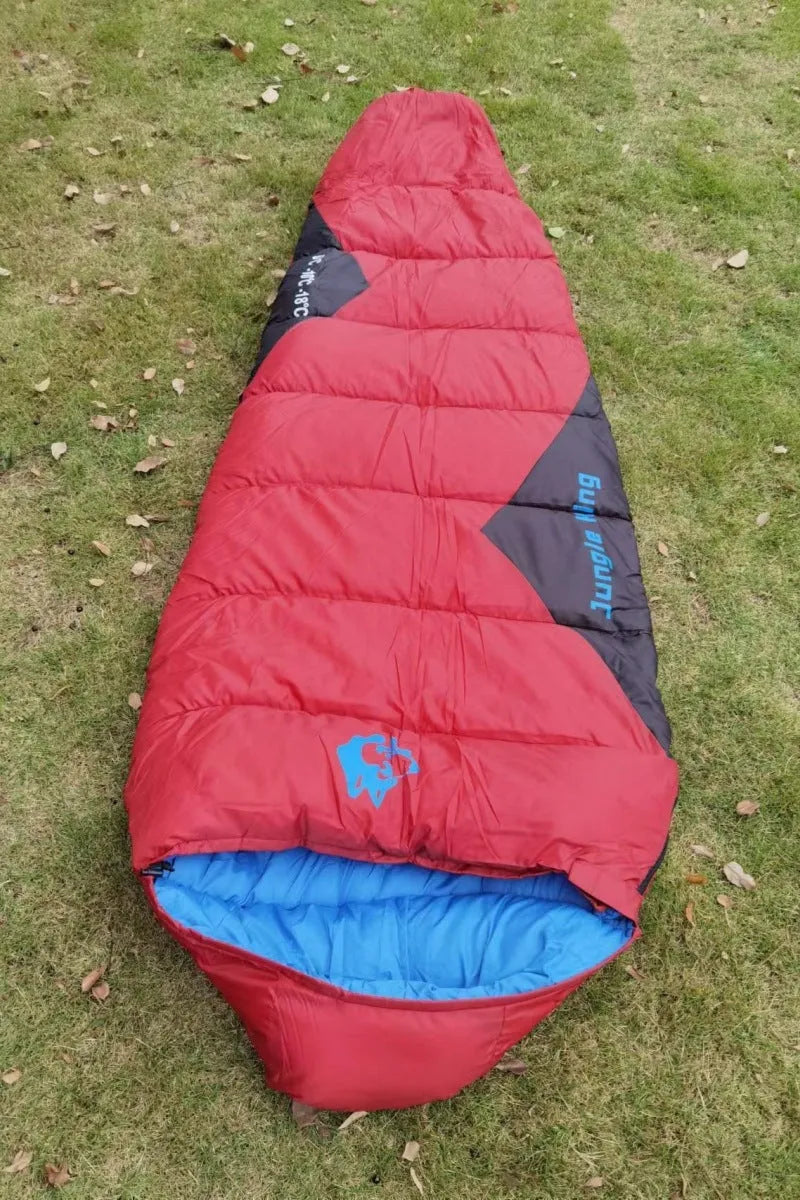 Camping sleeping bag with compression sack in Army Green colour for winter use.