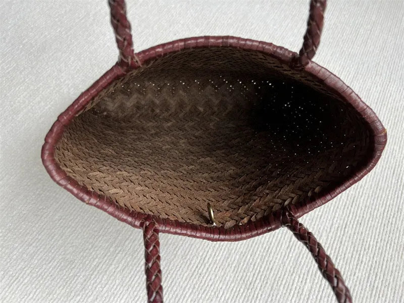 Brown woven tote shoulder bag with three-dimensional pocket made from first layer cowhide leather